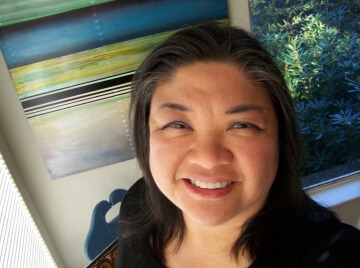 A headshot of WMM Vice President Claire Aguilar