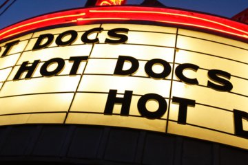 A photo of Hot Docs on a theater marquee