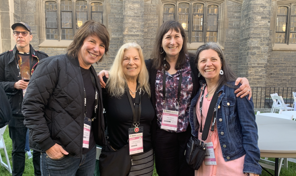 Group photo of WMM Executive Director Debra Zimmerman and Managing Director Kendra Hodgson with the filmmakers of "Arrest the Midwife"
